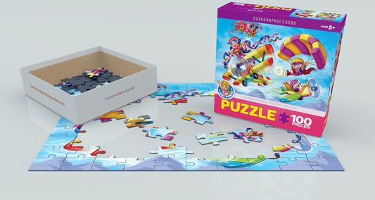 Children's puzzle with pieces scattered on a flat surface and packaging in the background.